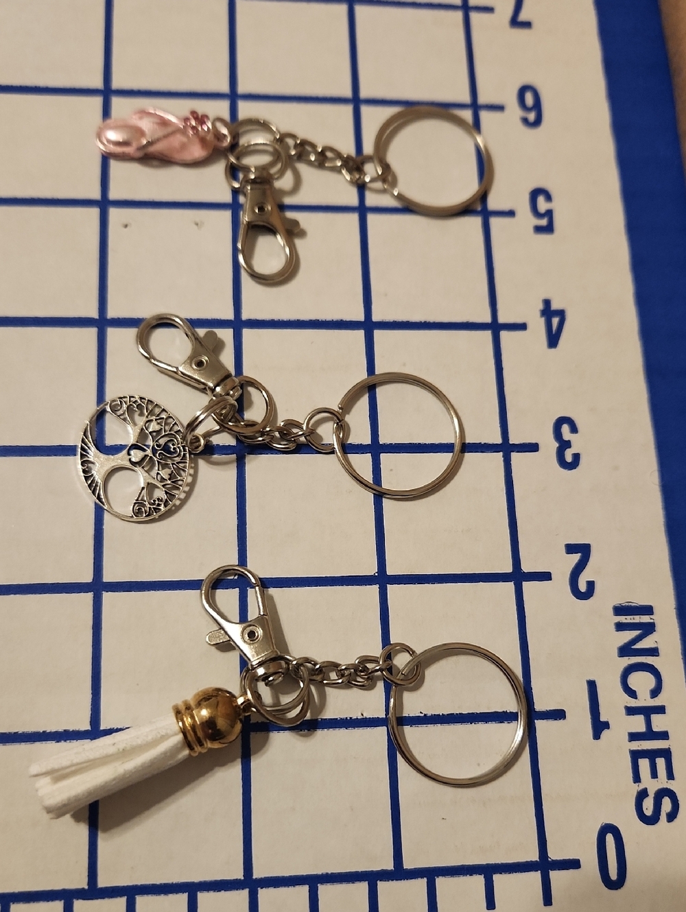 Silver Tone Keychain with White Tassel and Tree Charm